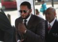 CHICAGO, ILLINOIS - JUNE 26: R&B singer R. Kelly (C) arrives at the Leighton Criminal Courts Building for a hearing on June 26, 2019 in Chicago, Illinois.  Kelly is facing several counts of aggravated sexual abuse.  (Photo by Scott Olson/Getty Images)