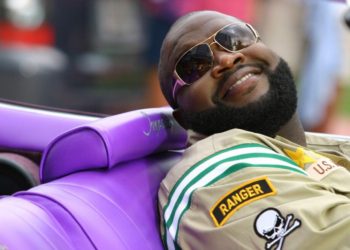 MIAMI BEACH , FL - JUNE 7:  Rick Ross in car outside hotel during a Daz video shoot featuring Rick Ross in South Beach on June 7, 2006 in Miami Beach, Florida. (Photo by Craig Bukata/Getty Images)